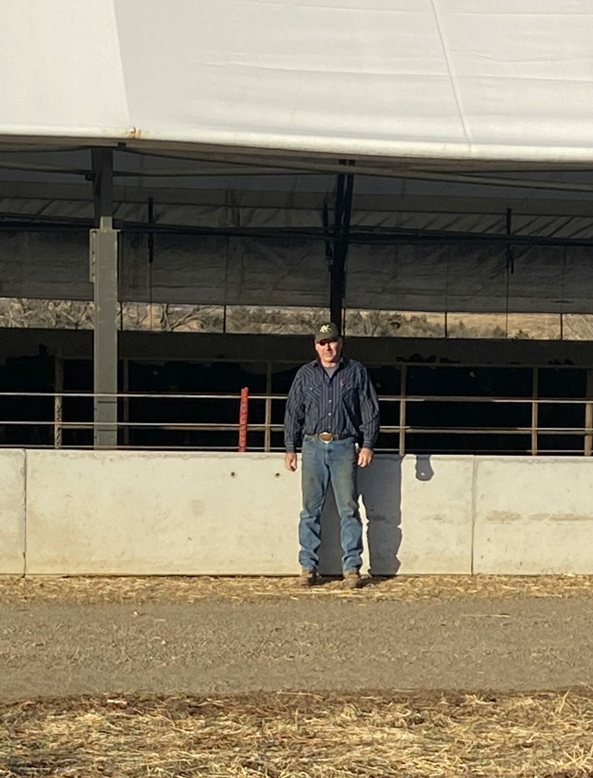 Chad Kehn in front of his cattle operation